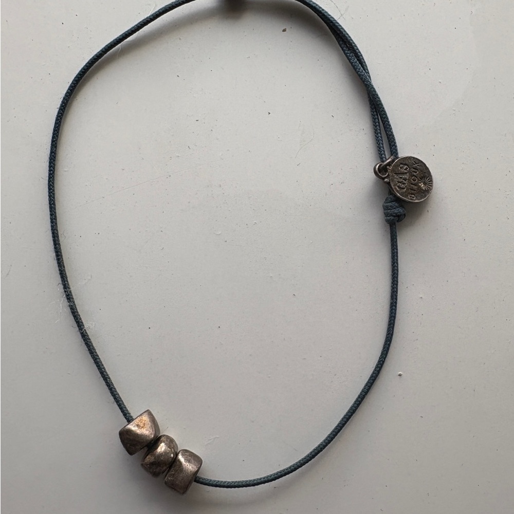 Silver Beaded Bracelet with Blue Cord